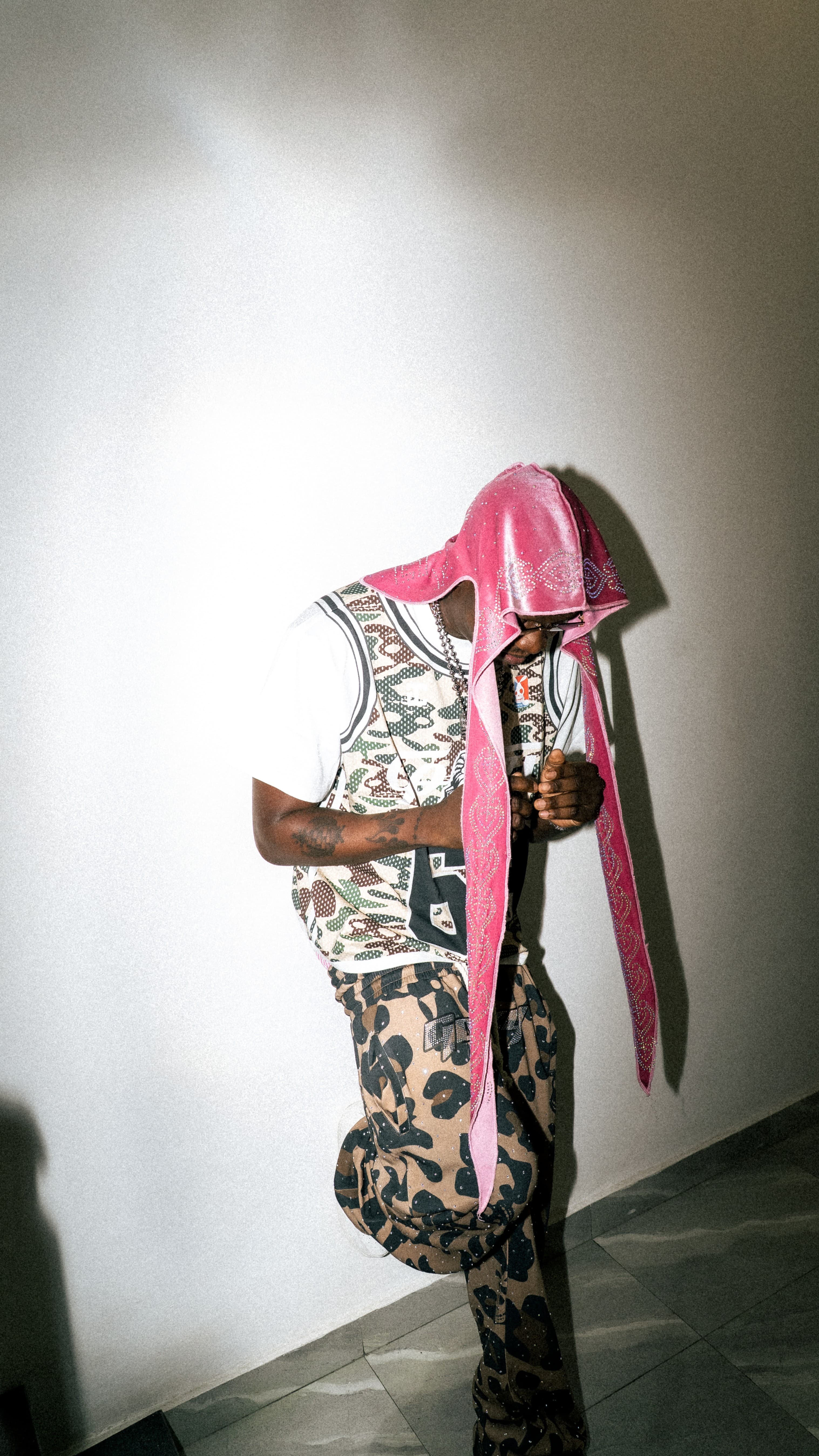 Editorial portrait highlighting shape and silhouette.